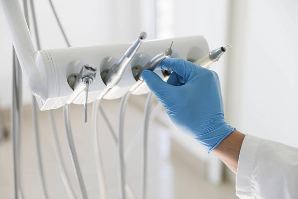 Professional Root Canal Treatment technician working in Thomaston, NY
